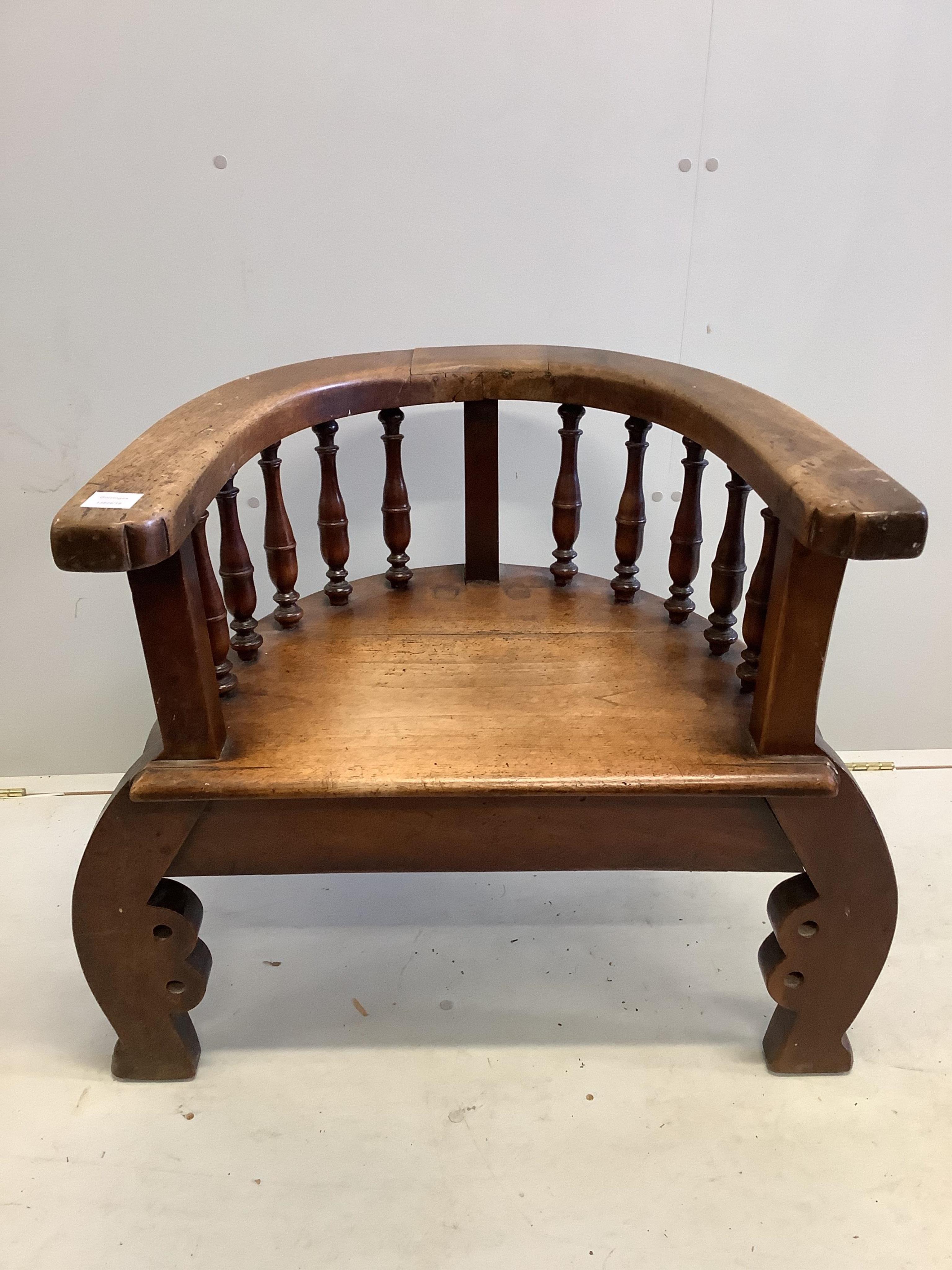 An unusual Victorian and later mahogany tub elbow chair, width 69cm, depth 60cm, height 70cm